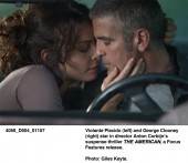 Violante Placido (left) and George Clooney (right) in The American