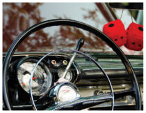 Vintage Automobile Black Wheel Interior With Red Dice Photo [221110-15]