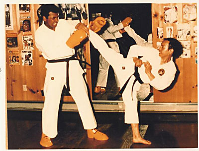 Muhammad Ali practices with Tae Kwon Do Grand Master Jhoon Rhee